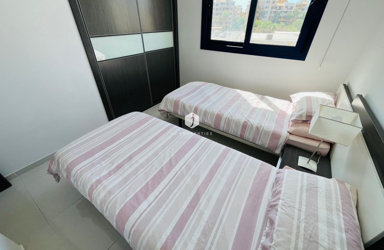 Resale - Apartment / flat -
Punta Prima - Costa Blanca
